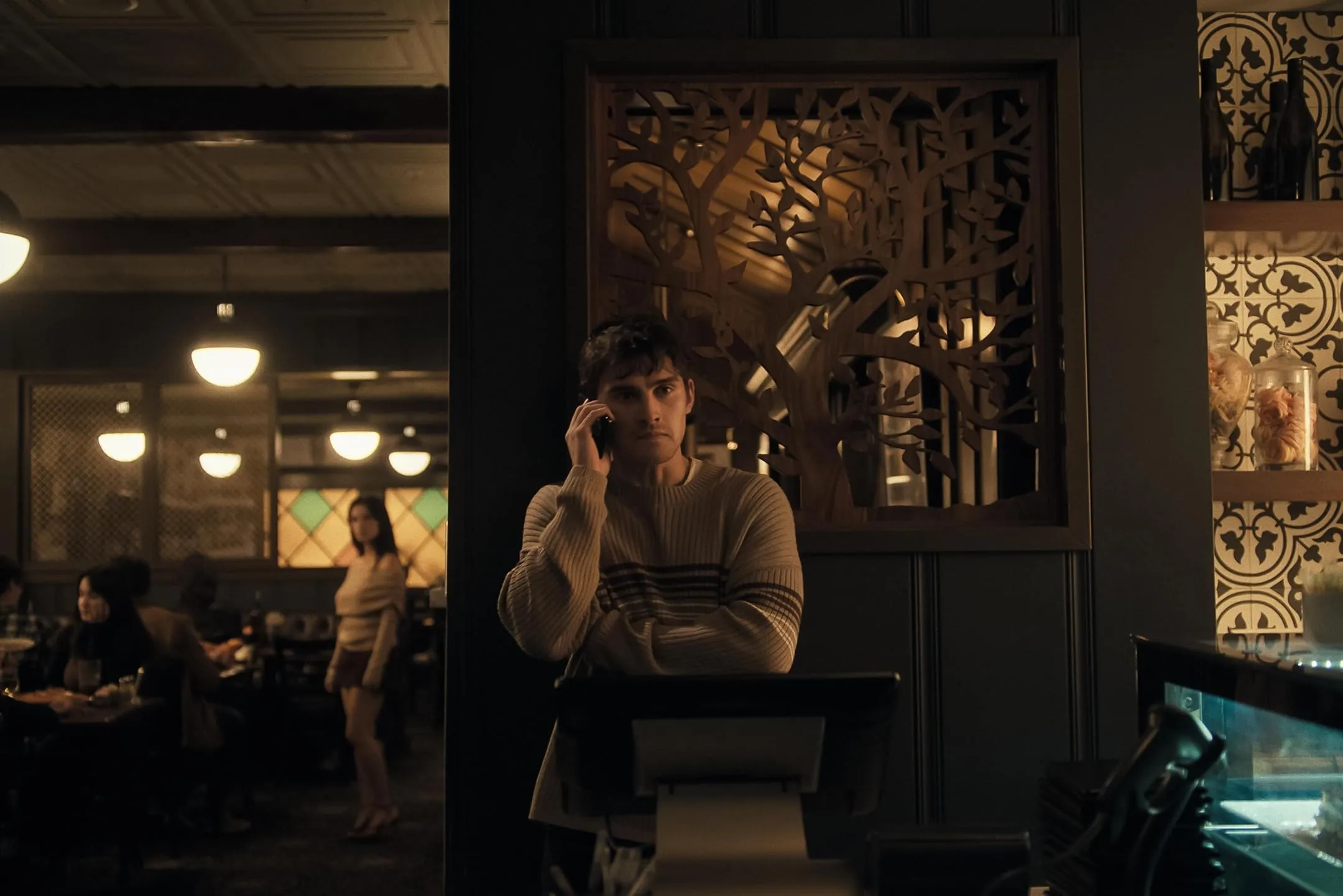 The two leads in a tense moment from the supernatural thriller