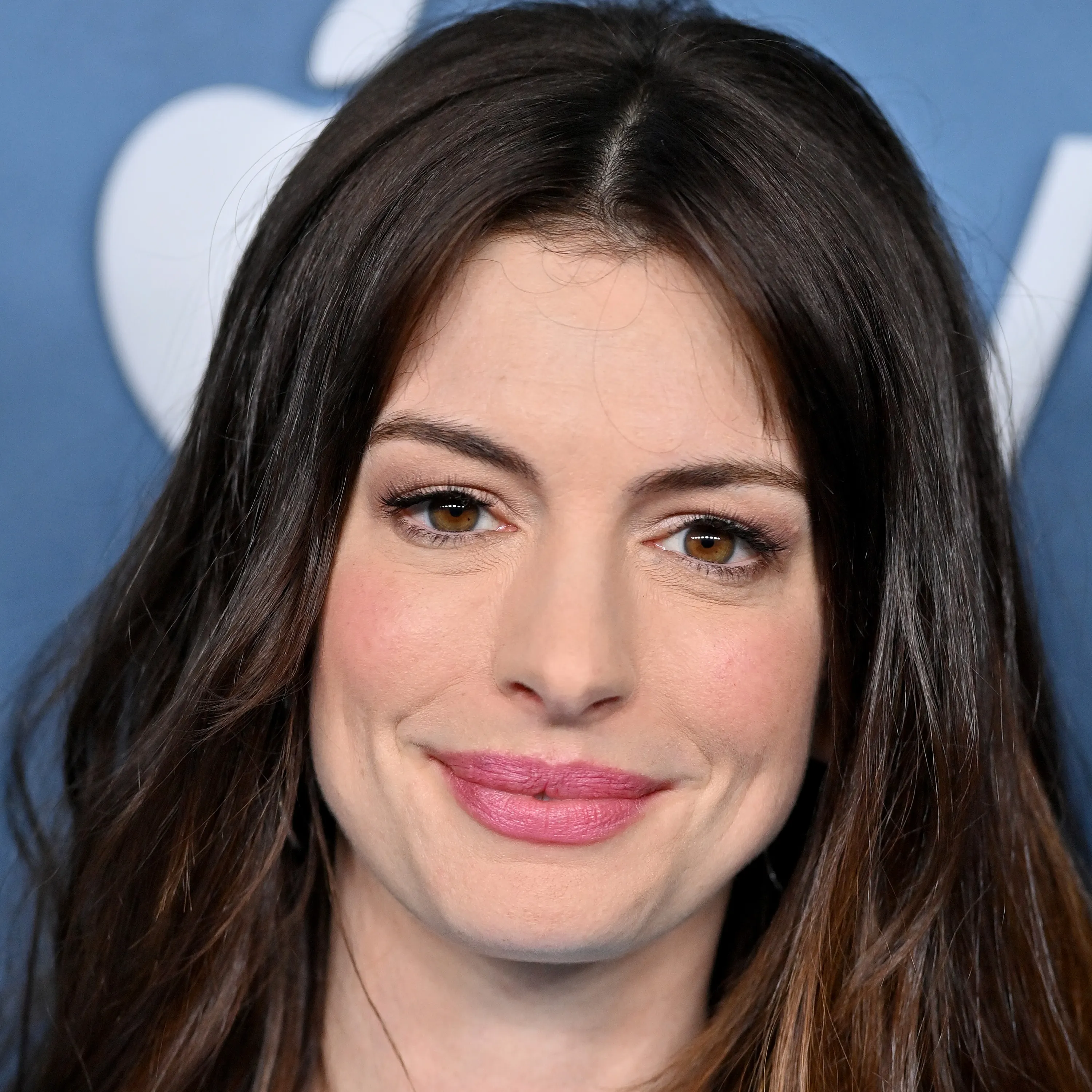 Anne Hathaway returning as a former assistant turned journalist
